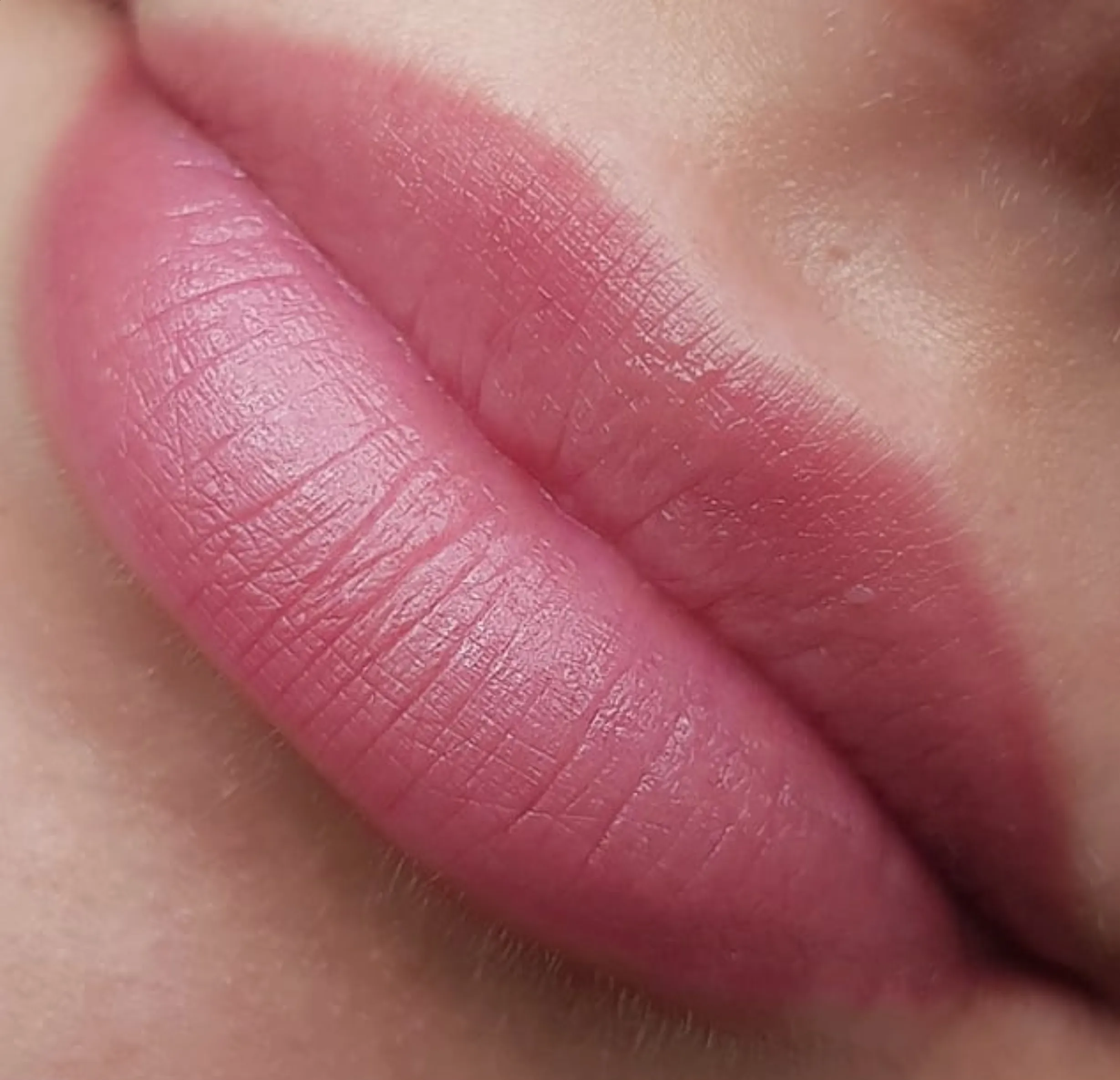 risks kissing after lip tattoo